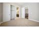 This bedroom has plush carpets, walk-in closet and a bathroom at 17054 Hop Clover Ave, Parker, CO 80134