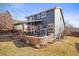 This backyard features a covered patio, perfect for outdoor entertaining and relaxation at 1315 Laurel St, Broomfield, CO 80020