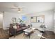 Bright and airy living room with a contemporary design, hardwood floors, and natural light at 1315 Laurel St, Broomfield, CO 80020