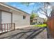 Backyard with a white garage building and stone path at 1474 S Emerson St, Denver, CO 80210
