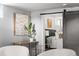 Basement bedroom with an art piece above a small console table at 1474 S Emerson St, Denver, CO 80210