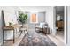 Cozy basement featuring a desk, chair, sofa, and stylish decor at 1474 S Emerson St, Denver, CO 80210