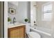 Bathroom with decorative vanity, shower and tub, and modern finishes at 1474 S Emerson St, Denver, CO 80210