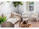 Cozy living room with large windows, plush seating, and stylish decor at 1474 S Emerson St, Denver, CO 80210