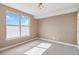Bright bedroom with soft natural light, neutral walls, and plush carpeting at 9079 E Panorama Cir # 520, Englewood, CO 80112