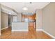Inviting living room flowing into a kitchen with stainless appliances and granite countertops at 9079 E Panorama Cir # 520, Englewood, CO 80112