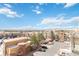 A balcony with beautiful views overlooking the neighborhood, buildings, and parking lots at 9079 E Panorama Cir # 520, Englewood, CO 80112