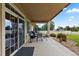 Enjoy the outdoors on this cozy covered patio with space for seating and outdoor dining at 8007 Sunrise Cir, Frederick, CO 80516