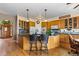 Well-designed kitchen with granite counters, an island, and stainless appliances at 8007 Sunrise Cir, Frederick, CO 80516