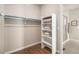 Spacious walk-in closet with shelving and hanging rods at 1845 Marlowe E Cir, Erie, CO 80516