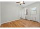 Hardwood flooring in the bedroom, plus a door leading to the outside of the house and two other entryways at 1632 Ulster St, Denver, CO 80220
