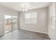 Bright dining area with sliding glass doors for seamless indoor-outdoor living at 17817 Dandy Brush Dr, Parker, CO 80134