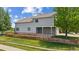 Beautiful backyard featuring a spacious wooden deck and a lush green lawn at 10570 Echo Ct, Firestone, CO 80504