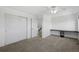 Neutral carpet fills the bedroom, which includes a closet and a built-in desk at 10570 Echo Ct, Firestone, CO 80504