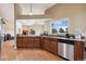 Stylish kitchen with stainless steel appliances, granite countertops and ample storage space at 3390 S Ensenada Way, Aurora, CO 80013