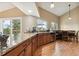 Beautiful kitchen with granite countertops, stainless steel appliances, and a cozy dining area at 3390 S Ensenada Way, Aurora, CO 80013