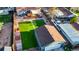 Aerial view of home with spacious backyard and a detached garage at 3471 W Exposition Ave, Denver, CO 80219