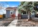 Charming home featuring well-maintained landscaping and a welcoming front porch at 3471 W Exposition Ave, Denver, CO 80219