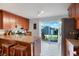 Well-maintained kitchen with island and view of the backyard at 3471 W Exposition Ave, Denver, CO 80219