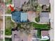 A well manicured lawn highlights this property. The backyard features a garden and parking pad at 4244 Grove St, Denver, CO 80211