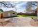 Detached garage with lush lawn and paved access at 4244 Grove St, Denver, CO 80211