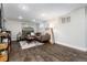 Modern living room with hardwood floors, recessed lighting, and comfortable seating at 4244 Grove St, Denver, CO 80211