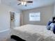 Inviting bedroom featuring natural light, soft carpet, and a comfortable bed at 4483 Fell Mist Way, Castle Rock, CO 80109