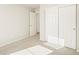 Inviting bedroom with an adjacent entry and a closet with sliding doors at 20982 E 66Th Ave, Aurora, CO 80019
