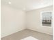 Bedroom with neutral carpet, paint and window with shades at 20982 E 66Th Ave, Aurora, CO 80019