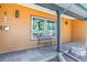 Charming front porch with bench seating and modern design at 5480 W Iowa Ave, Lakewood, CO 80232