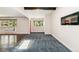 Bright living room with plush carpets, modern fireplace, ample natural light, and hardwood flooring at 5480 W Iowa Ave, Lakewood, CO 80232