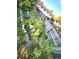 Side yard garden showcasing mature plants and a rustic wooden fence at 3216 S Granby Way, Aurora, CO 80014