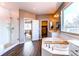 Bright bathroom with a glass shower, soaking tub, and modern fixtures throughout at 1902 Pioneer Cir, Lafayette, CO 80026