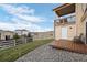 Spacious backyard features a deck, lush lawn, picturesque views, and a white fence at 2080 Shadow Creek Dr, Castle Rock, CO 80104