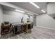 Large basement workshop with various tools, workbenches, and ample space for projects at 2080 Shadow Creek Dr, Castle Rock, CO 80104
