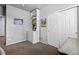 Bedroom/office space with shelving, storage drawers, and a sliding door closet at 2080 Shadow Creek Dr, Castle Rock, CO 80104