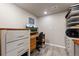 Dedicated home office with a built-in desk and shelving, providing a functional workspace at 2080 Shadow Creek Dr, Castle Rock, CO 80104