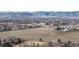 Scenic aerial view showcases the surrounding landscape and neighborhood at 11666 W 74Th Way, Arvada, CO 80005