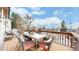 This expansive back deck provides ample outdoor space for seating, dining, and grilling with great views at 11666 W 74Th Way, Arvada, CO 80005