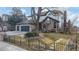 Lovely two-story home with a beautifully maintained front yard and an elegant wrought iron fence at 11666 W 74Th Way, Arvada, CO 80005