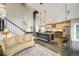 Open-concept living and dining area, seamlessly connected to the kitchen at 9094 W 103Rd Ave, Broomfield, CO 80021