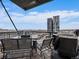 Balcony with city views and outdoor dining and seating at 2020 Arapahoe St # 1150, Denver, CO 80205