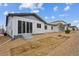 Backyard featuring a back patio, landscaping potential and views of the neighborhood at 6625 N Nepal St, Aurora, CO 80019