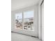 Bedroom view showcasing natural light and a view of the exterior neighborhood at 6625 N Nepal St, Aurora, CO 80019