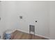 Bright laundry room with new fixtures and space for a washer and dryer at 6625 N Nepal St, Aurora, CO 80019