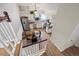 Eat-in kitchen featuring white cabinets, stainless appliances and light wood countertops at 8896 W Teton Cir, Littleton, CO 80128