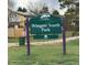 Wingate South Park signage with information about Foothills Park & Recreation District in a grassy area at 8896 W Teton Cir, Littleton, CO 80128