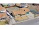 An aerial view of the home and neighborhood showing the yard and neighboring homes at 14441 Maxwell Pl, Denver, CO 80239