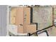 Aerial view of home with empty backyard, brown roof, and front driveway at 14441 Maxwell Pl, Denver, CO 80239