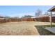 Large backyard is enclosed with wood fence, and has patio off the back of the house at 14441 Maxwell Pl, Denver, CO 80239